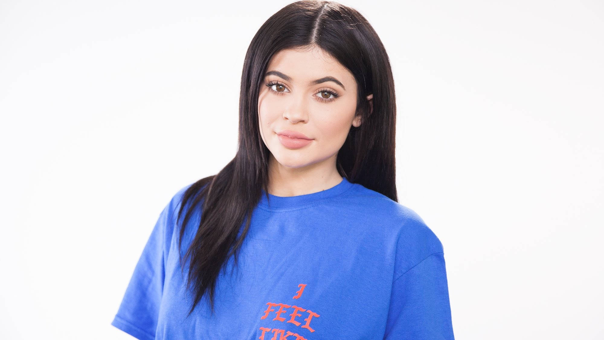 Kylie Jenner Wearing Blue Shirt Wallpaper - wallpapersok