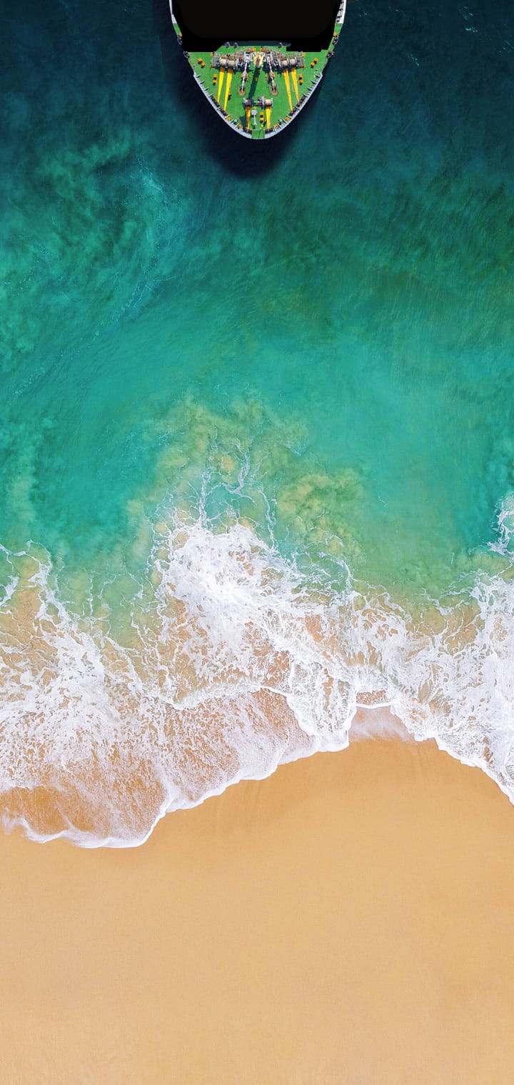 4k Iphone Ship On Beach Aerial View Wallpaper