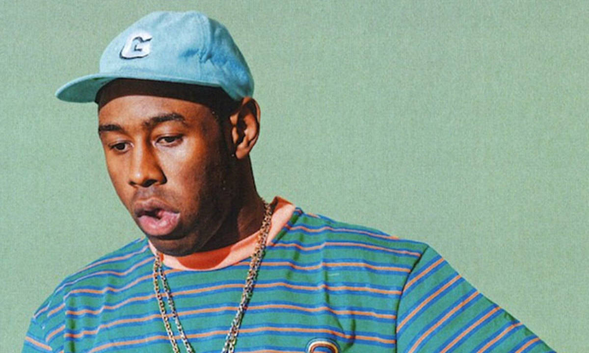 90s Rapper Tyler Making A Playful Face Wallpaper