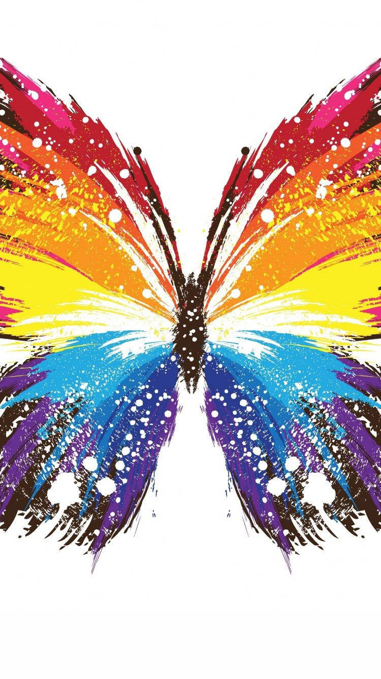 A Beautiful Rainbow Butterfly Flying Through The Vibrant Sky. Wallpaper