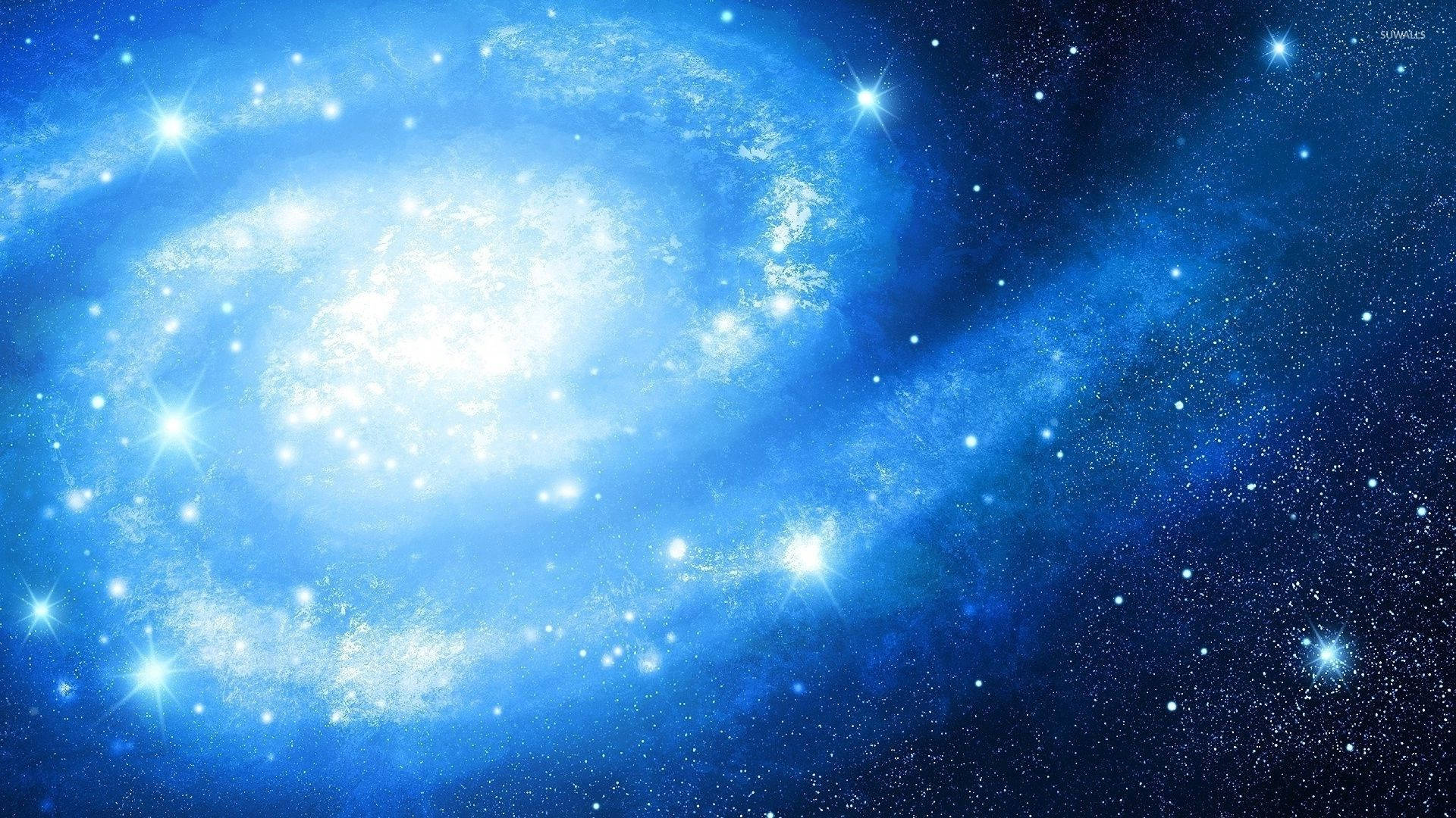 A Beautiful Swirling Blue Galaxy Wallpaper