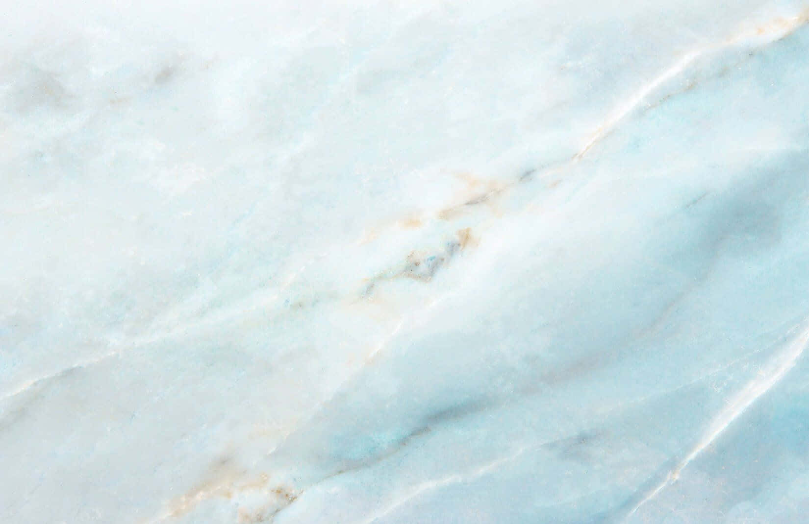 A Close Up Of A Blue Marble Surface Wallpaper