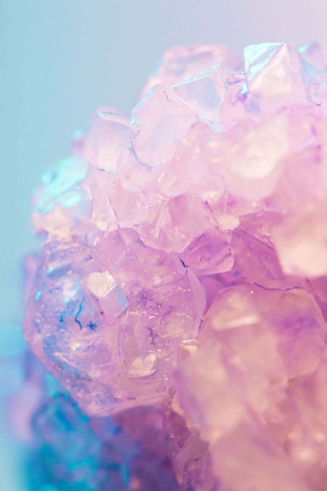 A Close Up Of A Purple Crystal Wallpaper