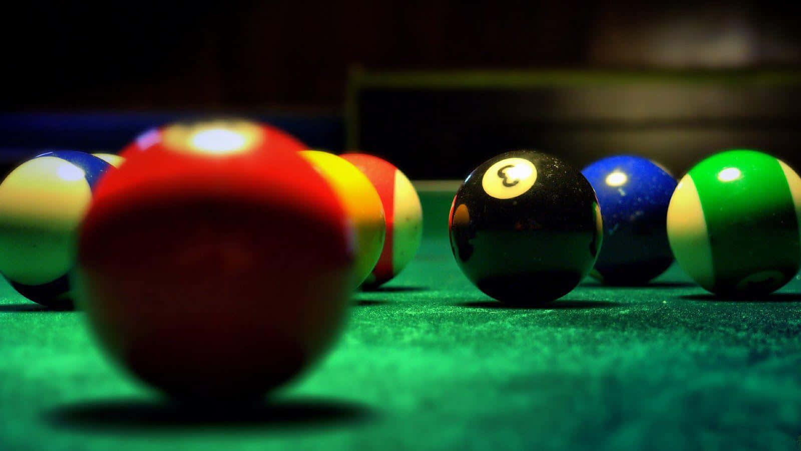 A Closer Look At Pool Table With Scattered Balls Wallpaper