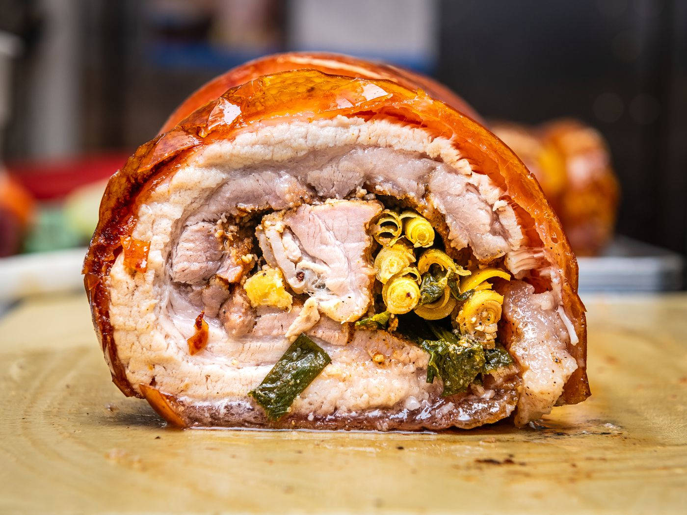 A Delectable Feast - Inside View Of Sumptuous Lechon Belly Roll Wallpaper