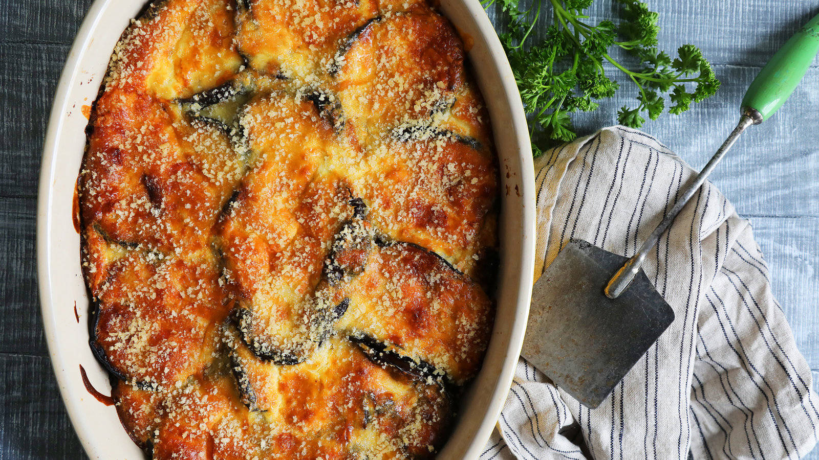 A Delicious Tray Of Moussaka Ready To Serve Wallpaper