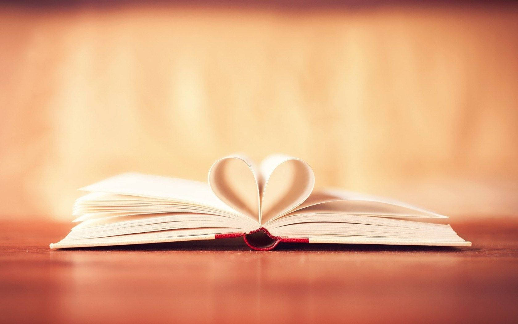 A Gentle Heart Beats Among Pages Wallpaper