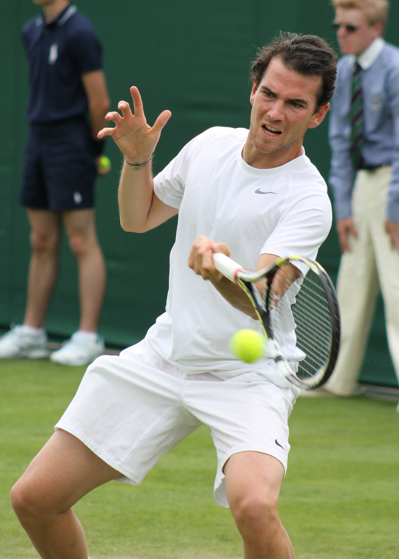 A Man Playing Tennis Wallpaper