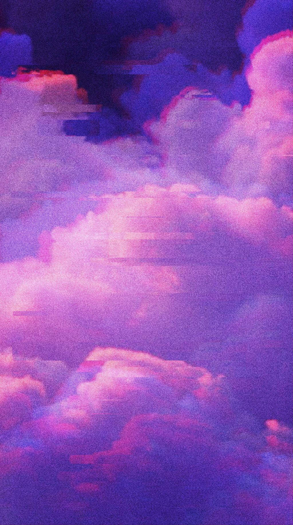 A Purple Sky With Clouds Wallpaper