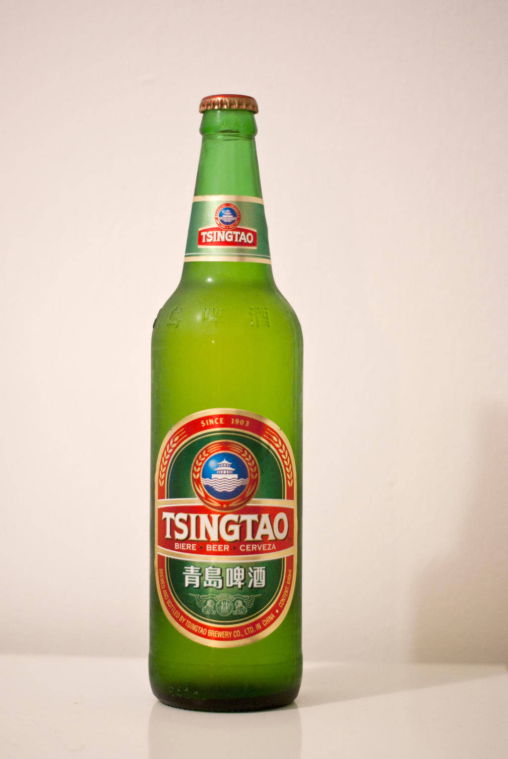 A Refreshing Taste Of Quality - Tsingtao Light Lager Beer Wallpaper