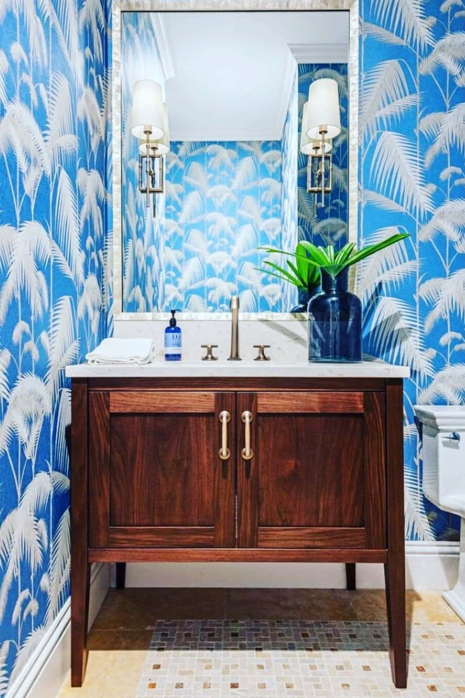 A Sumptuous Blue And White Bathroom With Feather Patterned Wall Wallpaper
