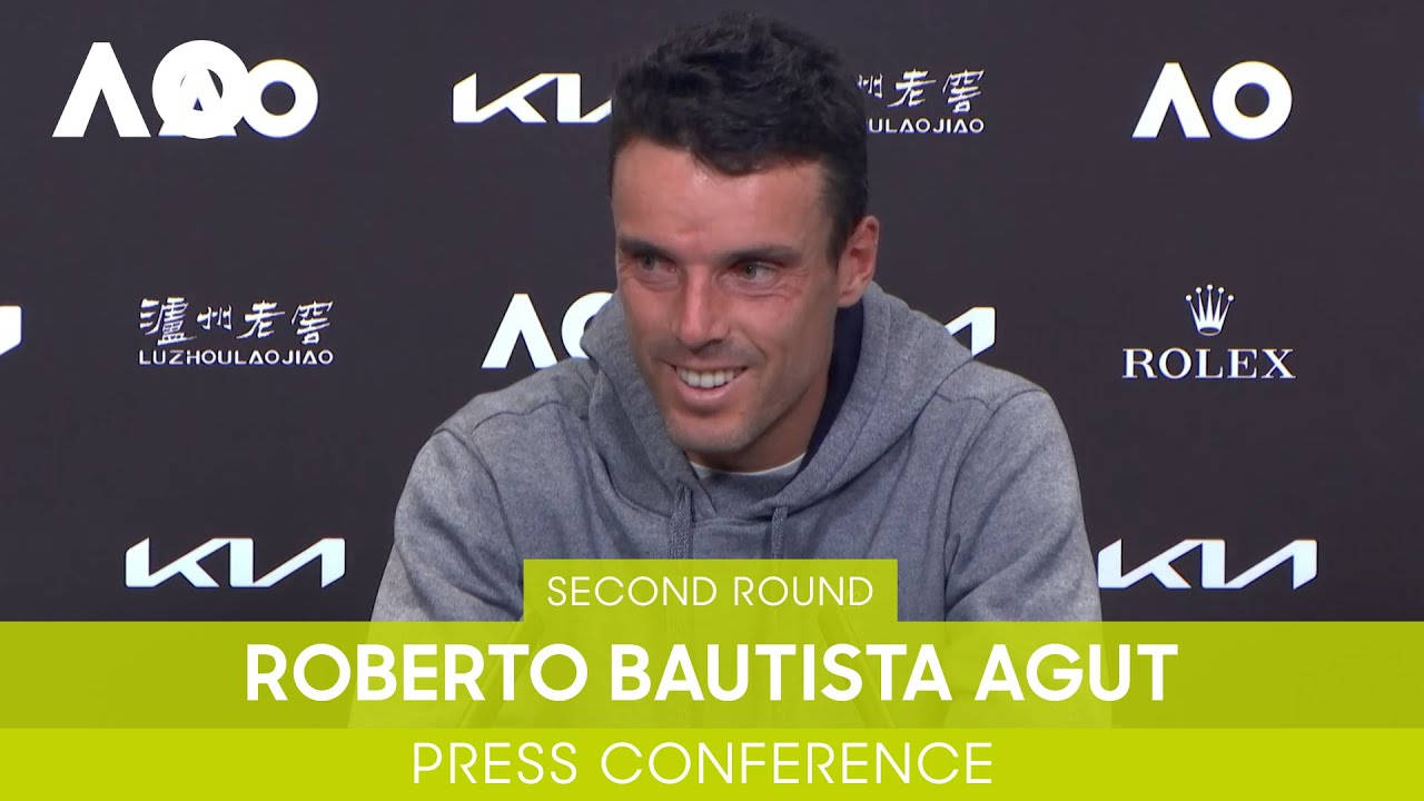 A Thoughtful Roberto Bautista Agut At A Press Conference Wallpaper