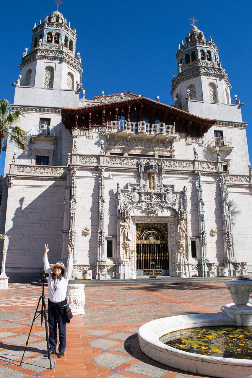 A Tourist In Front Of The Hearst Castle Wallpaper