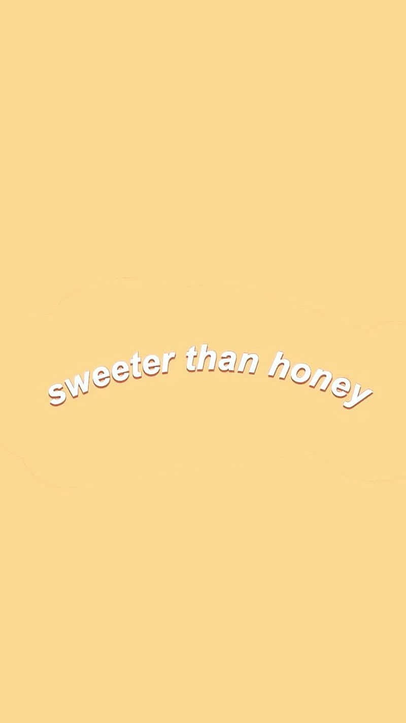 A Yellow Background With The Words'sweeter Than Honey'written On It Wallpaper