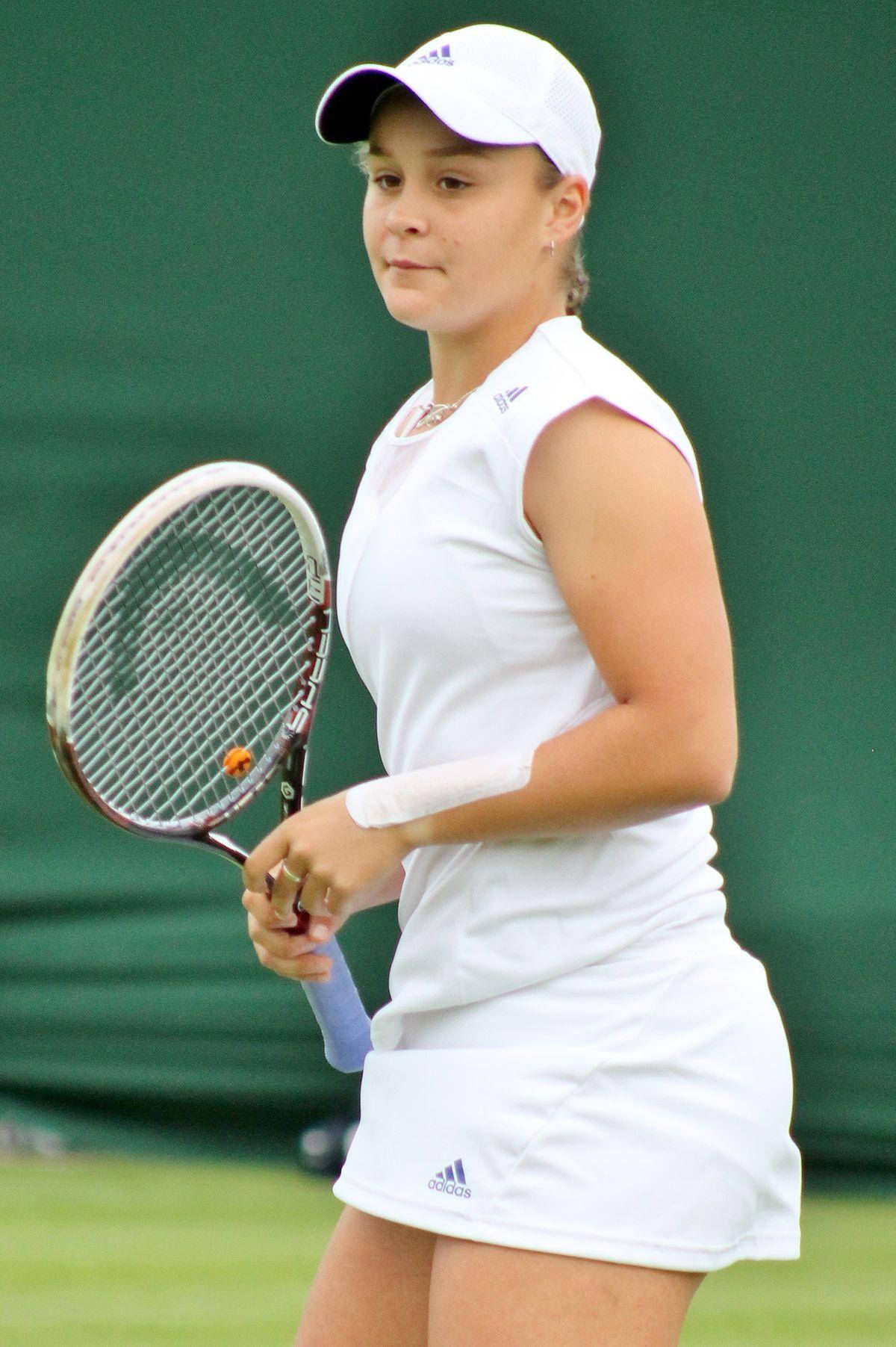 Ace Girl: Ashleigh Barty In Elegant All-white Tennis Gear Wallpaper