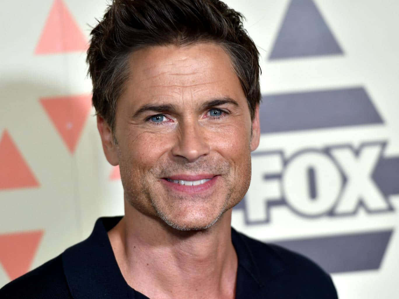 Actor Rob Lowe Looking To The Future Wallpaper