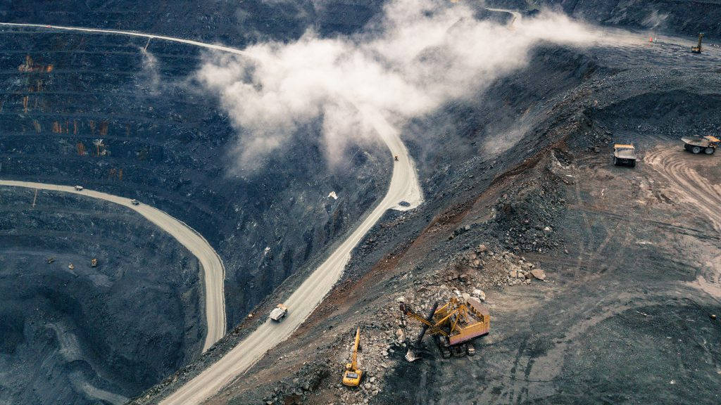 Aerial View Of Olimpiada Goldmines In Russia Wallpaper