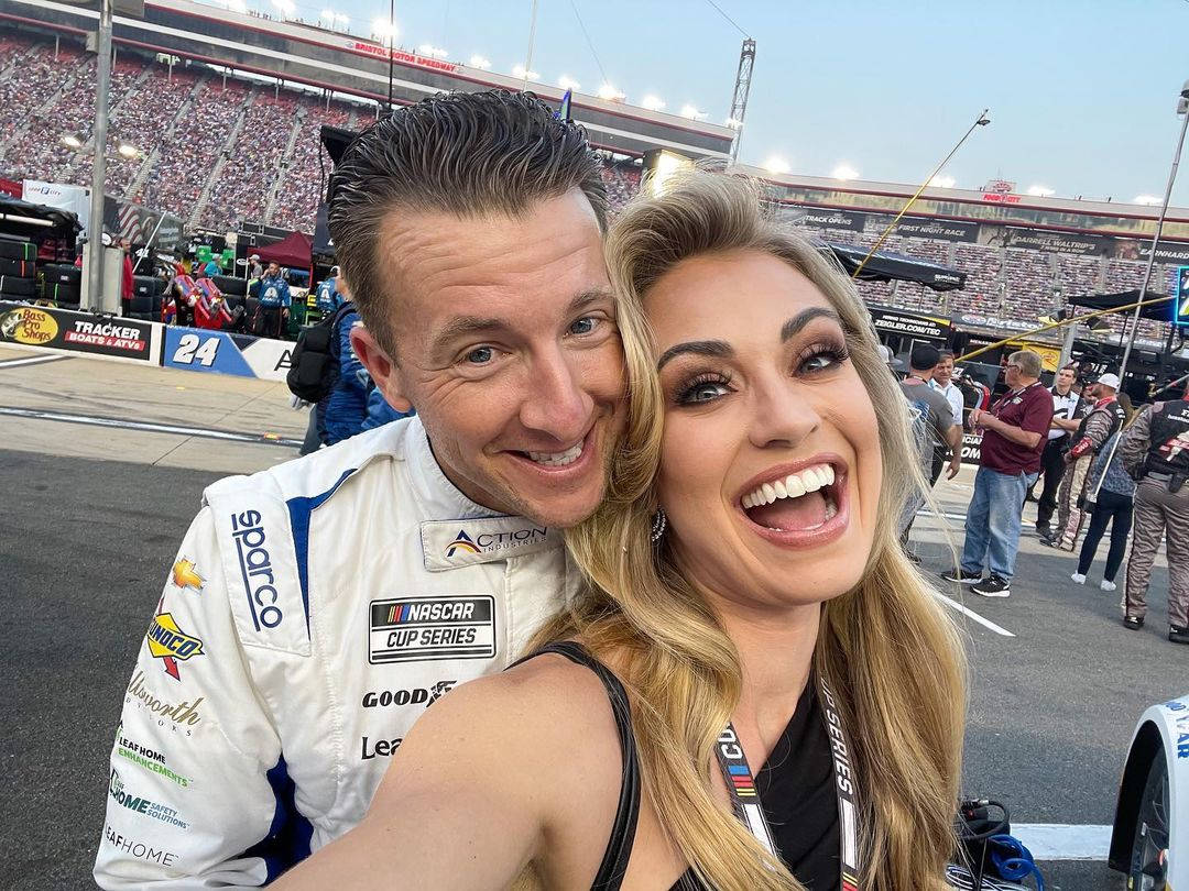 Aj Allmendinger With Smiling Wife Wallpaper