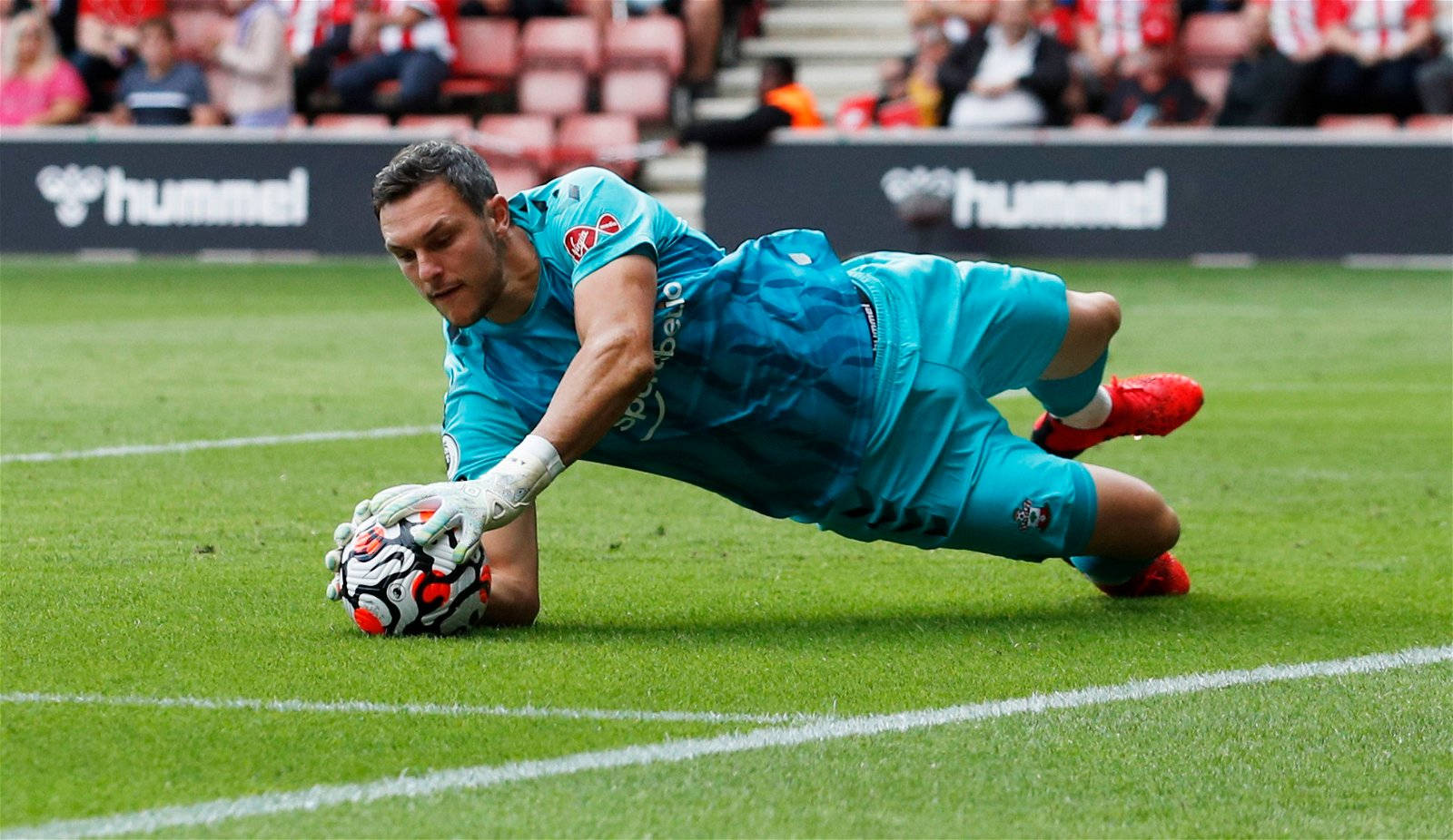 Alex Mccarthy Catches A Soccer Ball Wallpaper