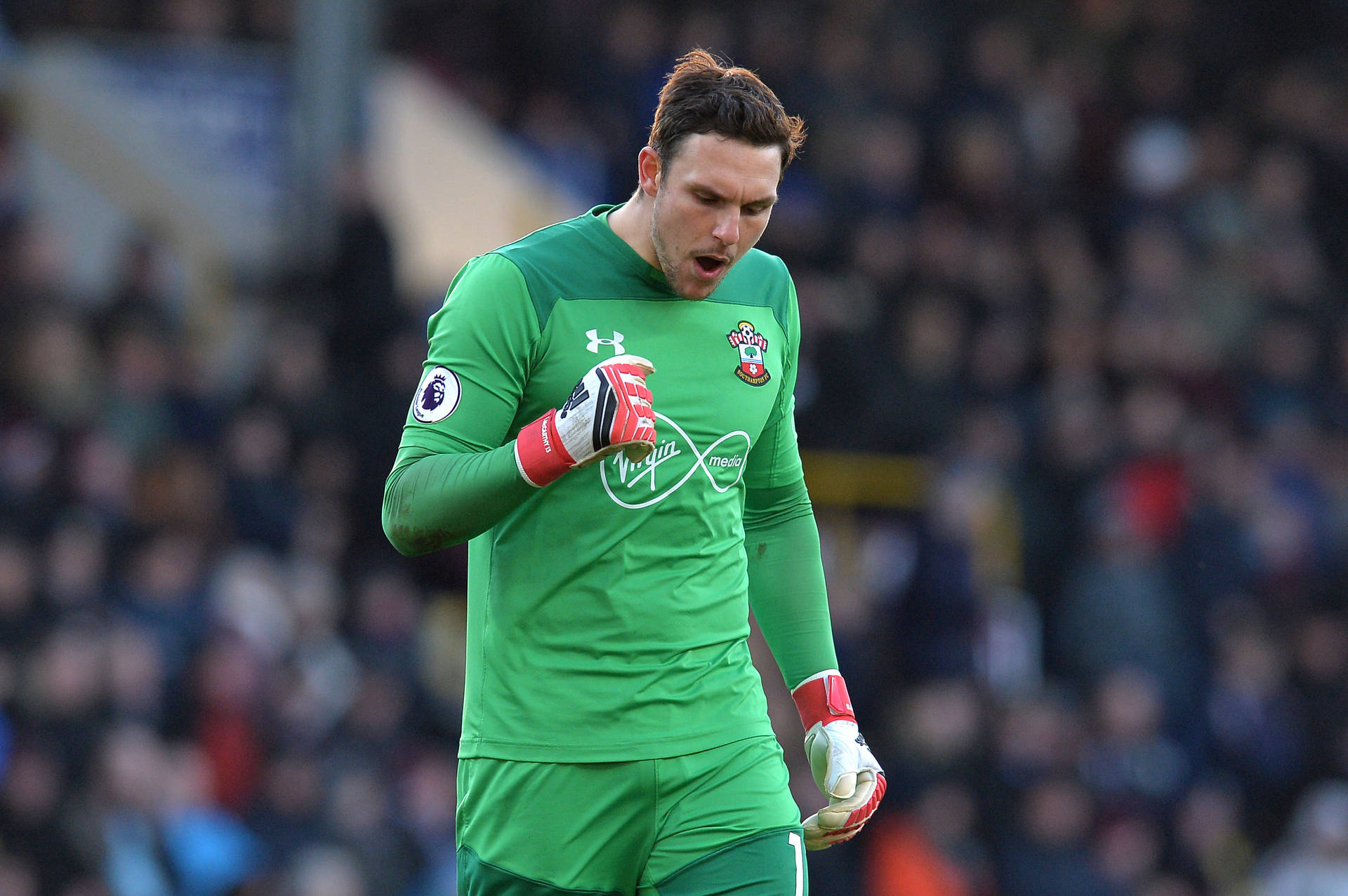 Alex Mccarthy In Action With A Green Jersey Wallpaper