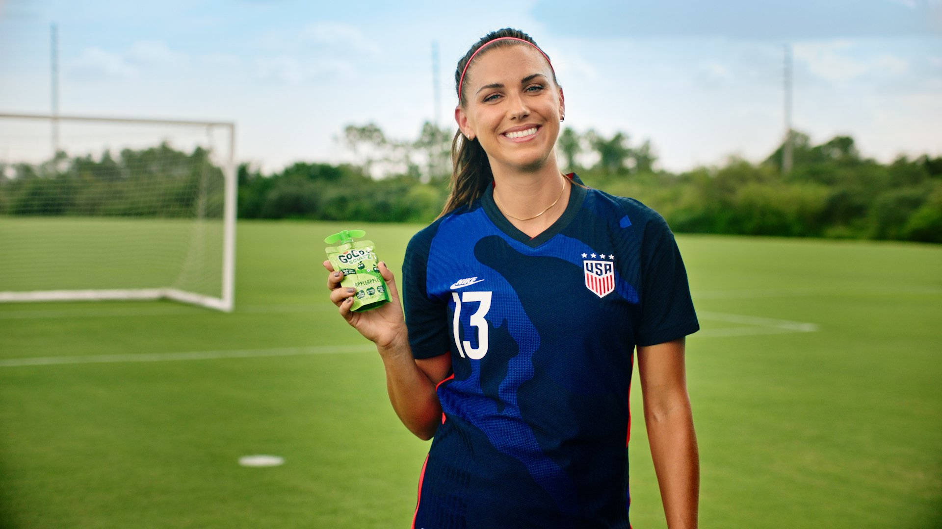 Alex Morgan In Gogo Squeez Ad Wallpaper