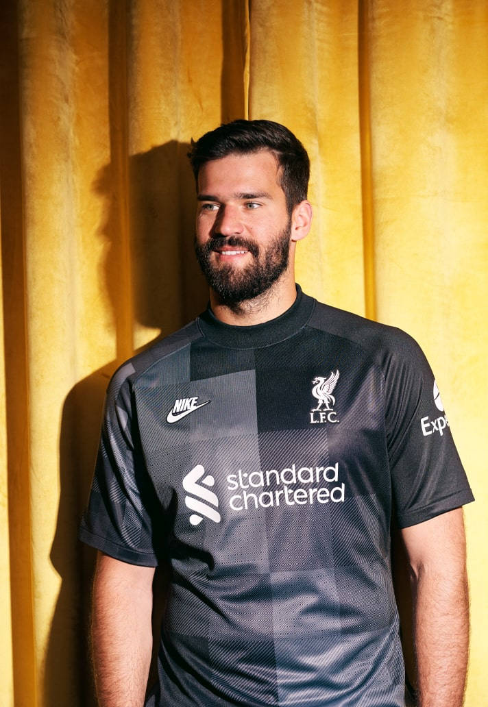 Alisson Becker Yellow Background Wallpaper