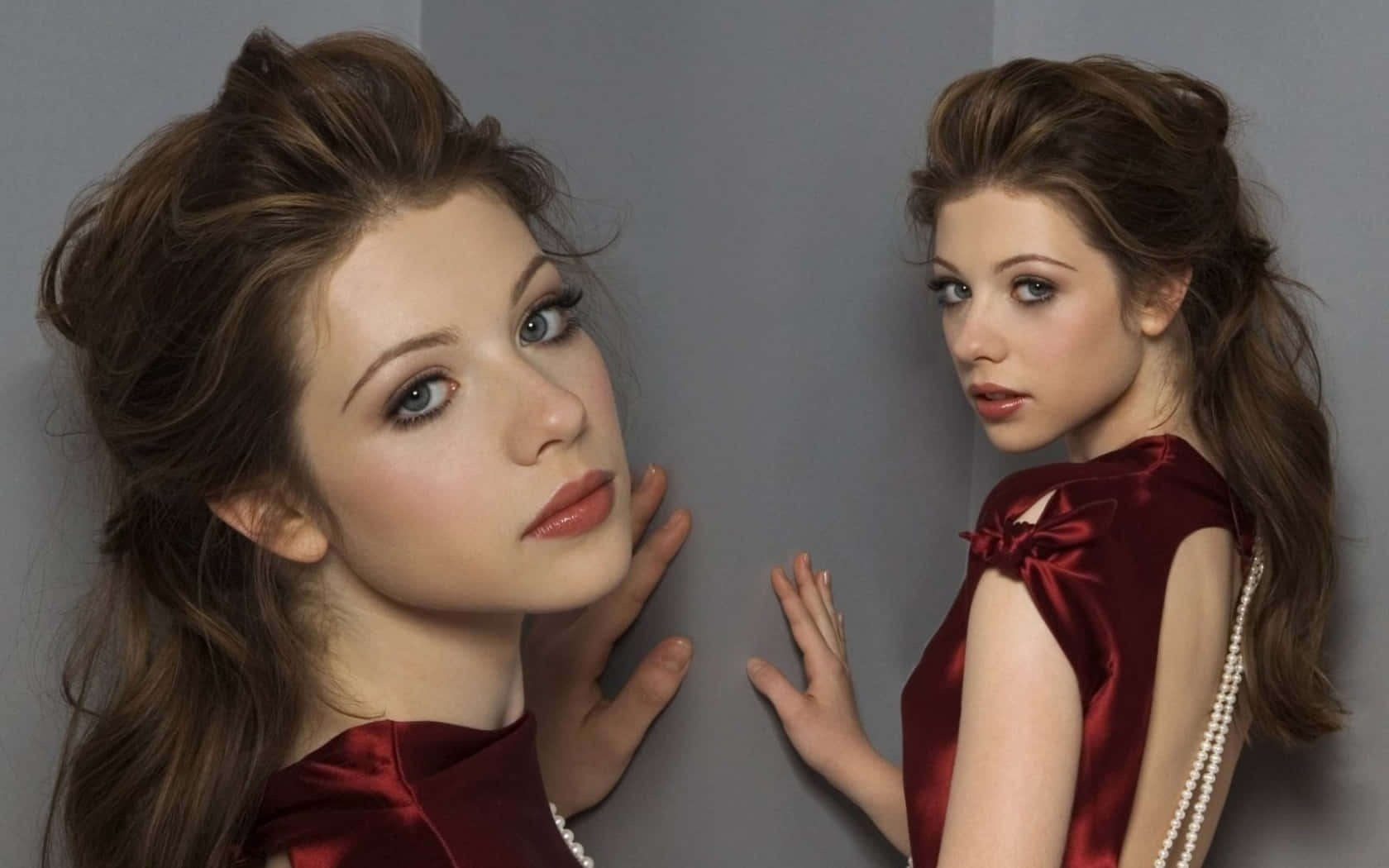 Alluring Michelle Trachtenberg Posing For A Portrait Wallpaper