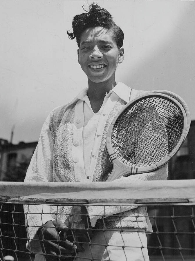 Althea Gibson In Tennis Court Wallpaper