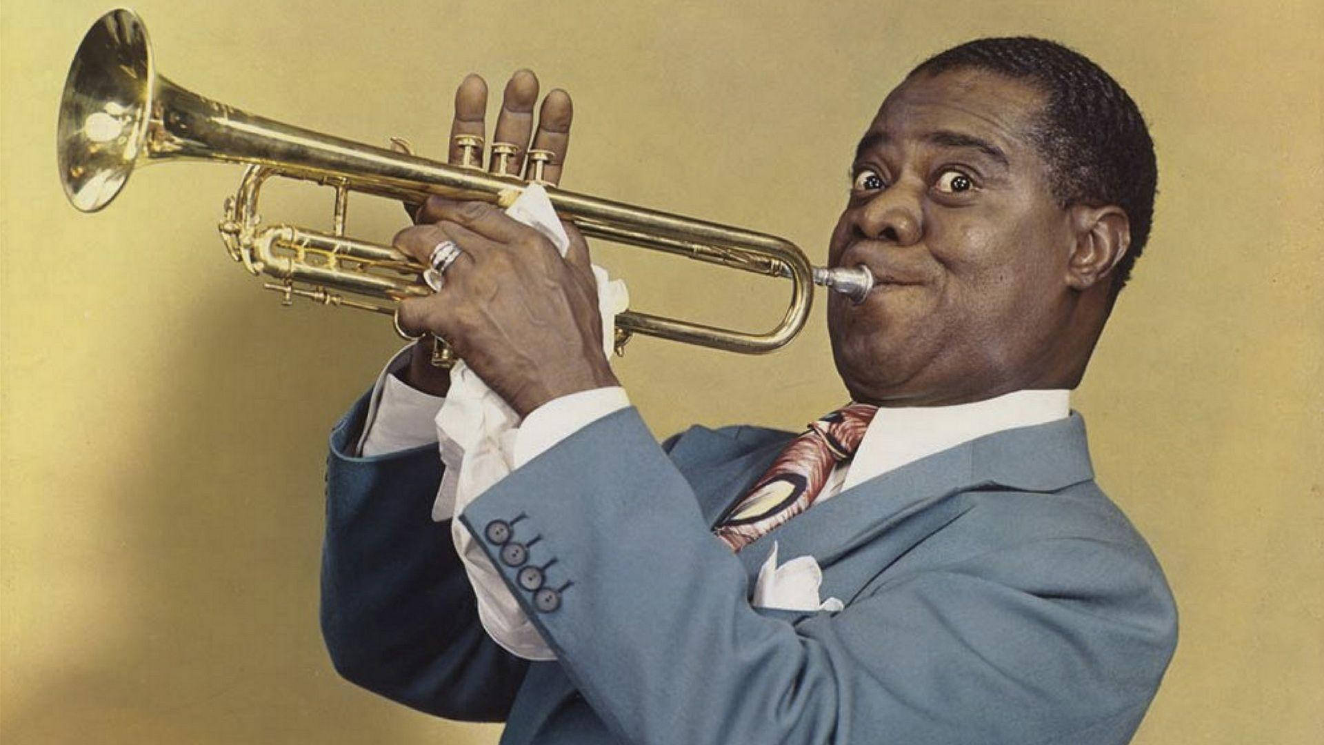 American Trumpeter And Vocalist Louis Armstrong In Performance Wallpaper