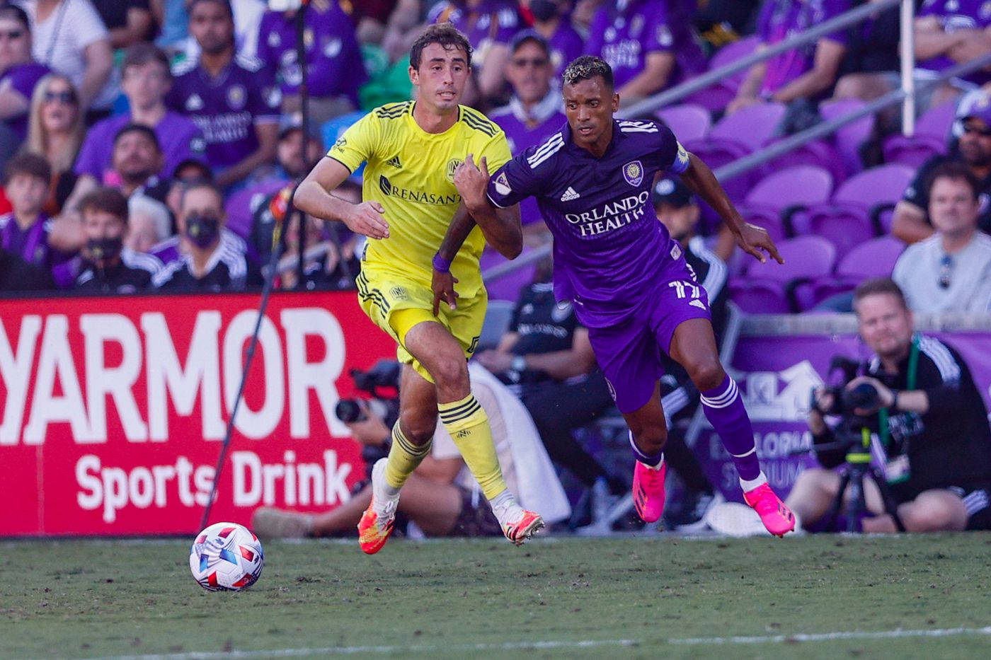 An Intense Match Between Orlando City And Nashville In Major League Soccer Wallpaper