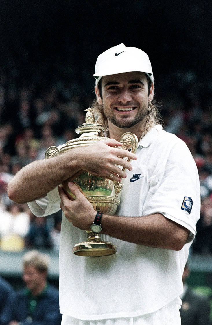 Andre Agassi Hugging 1994 Us Open Trophy Wallpaper