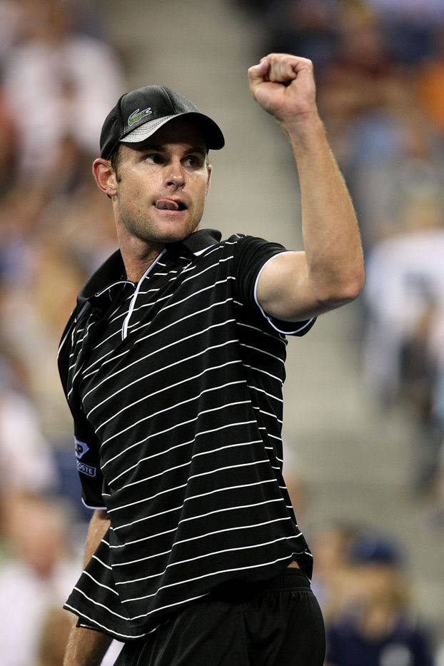 Andy Roddick Celebrating Victory With Raised Arm Wallpaper