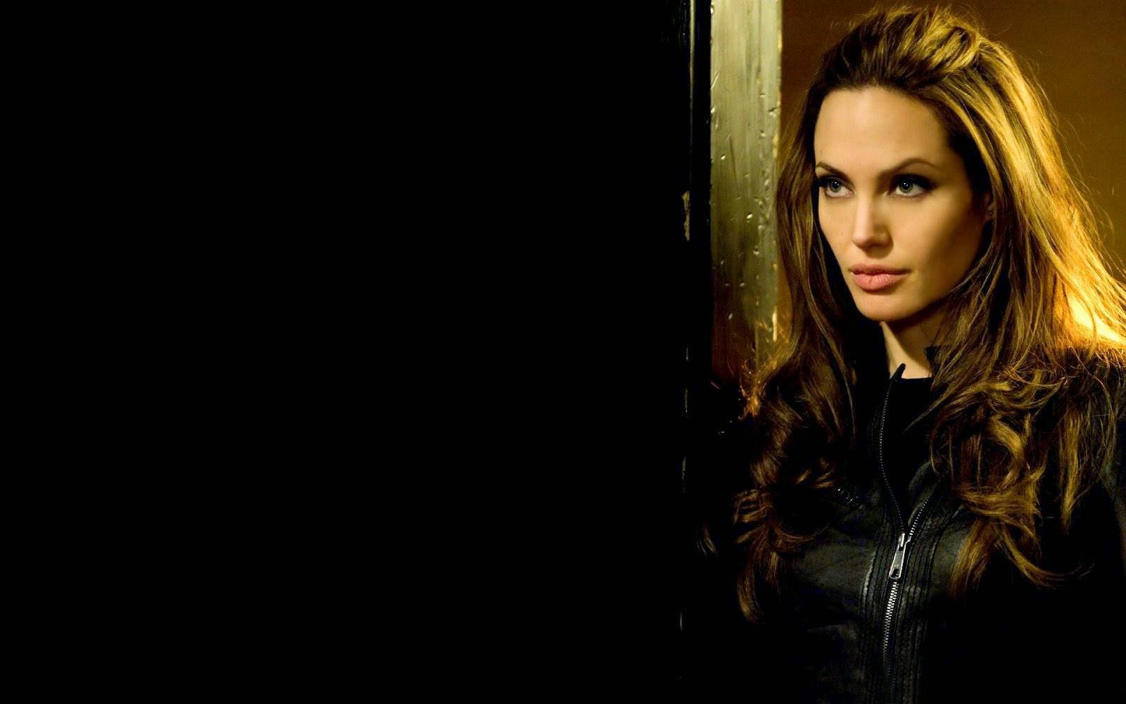 Angelina Jolie In Black Leather Wallpaper