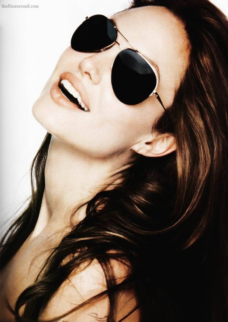 Angelina Jolie Wearing Aviator Glasses Wallpaper
