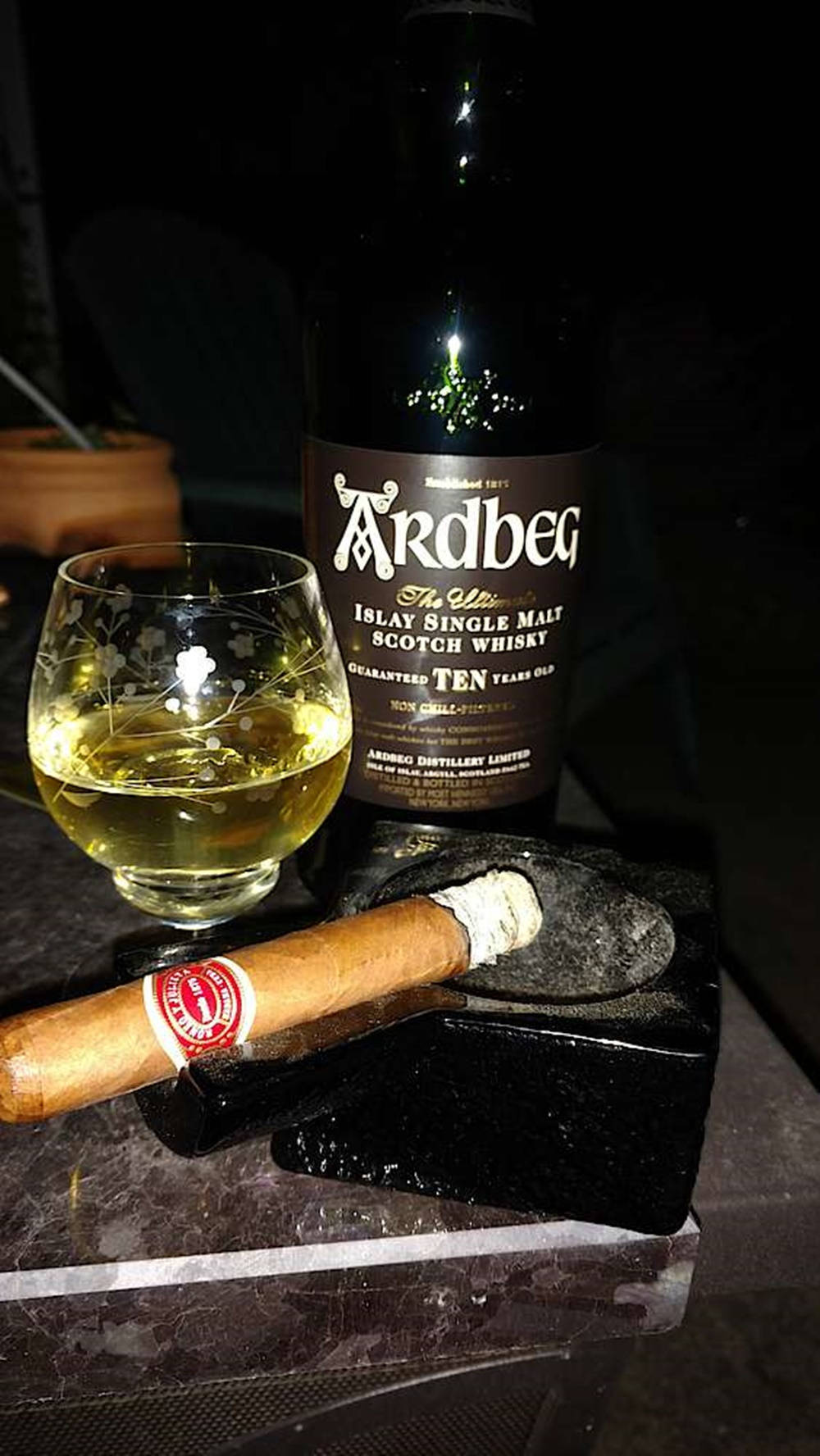 Ardbeg Whisky Bottle And Cigarette Wallpaper