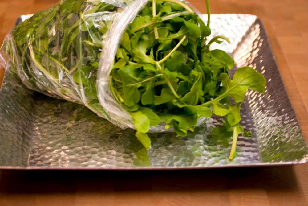 Arugula Leaves In A Plastic Bag Wallpaper