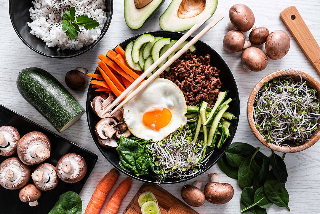 Authentic Korean Bibimbap Dish On Table Wallpaper