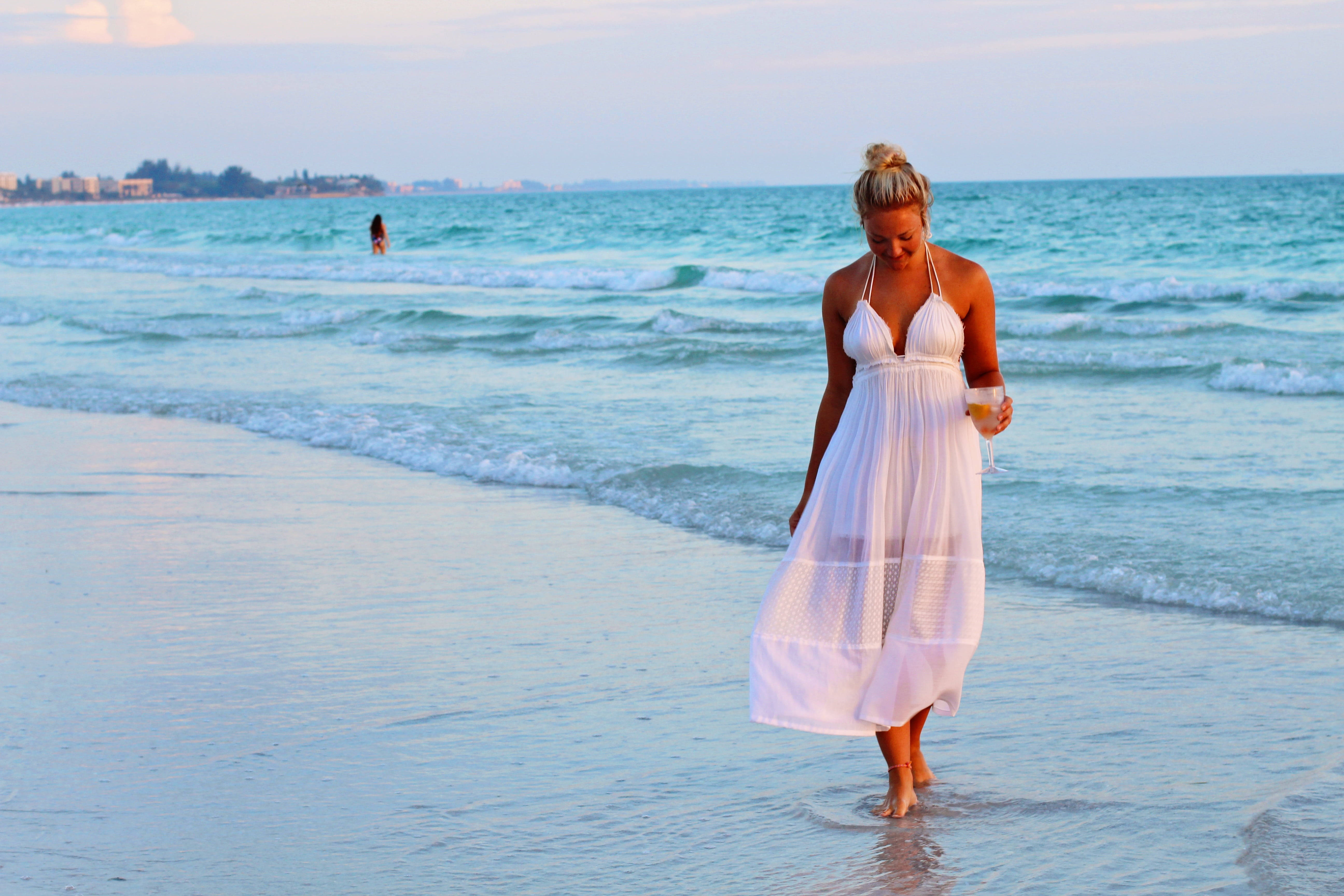 Beach Girl Walking On Shore Wallpaper