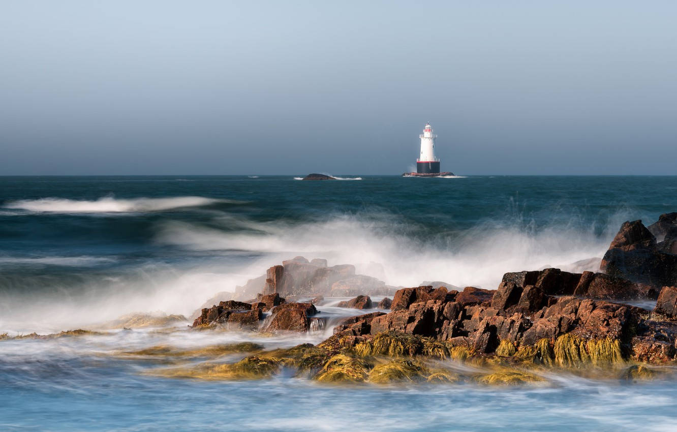 Beach Waves Against The Rocks In Rhode Island Wallpaper