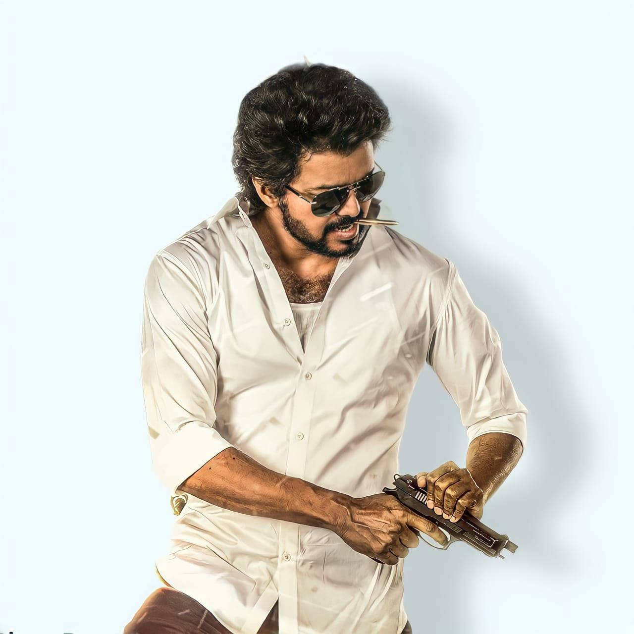 Beast Vijay Holding A Weapon Wallpaper