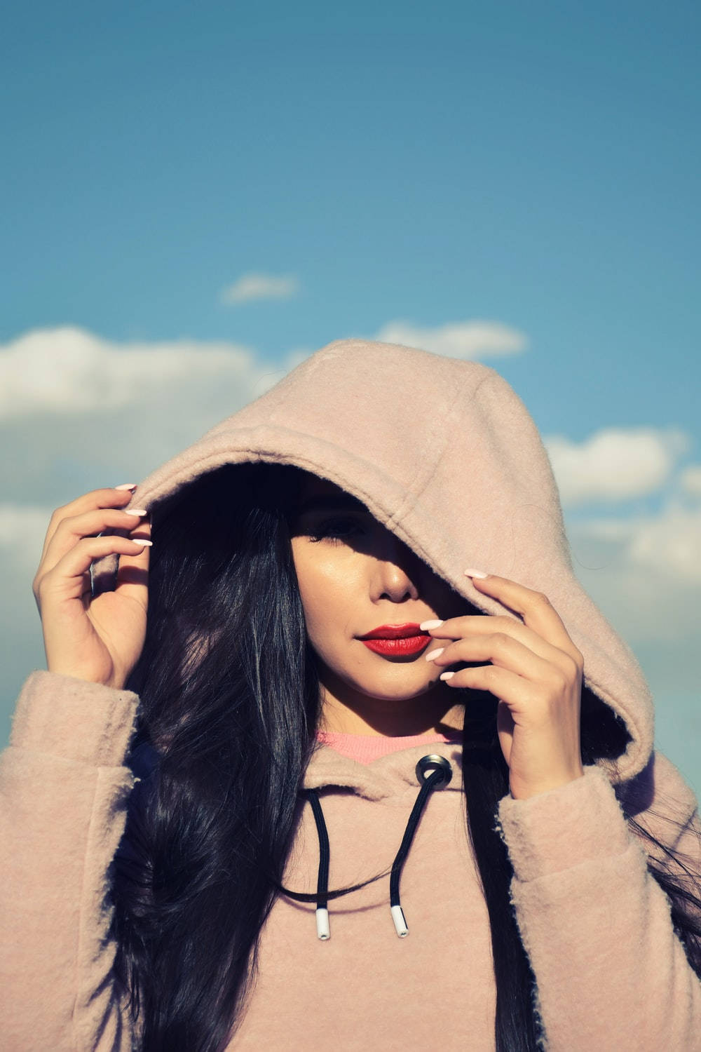 Beautiful Woman Wearing Hoodie Wallpaper