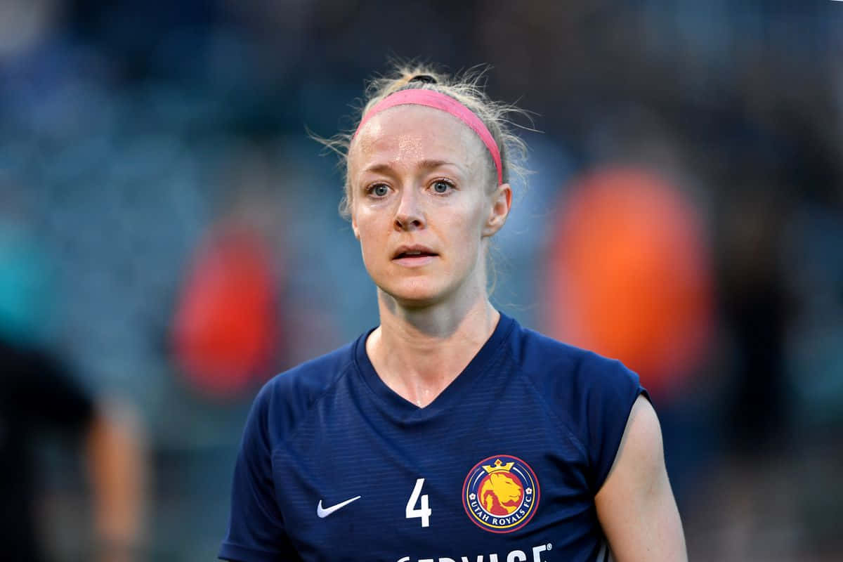 Becky Sauerbrunn In Action On The Football Field Wallpaper