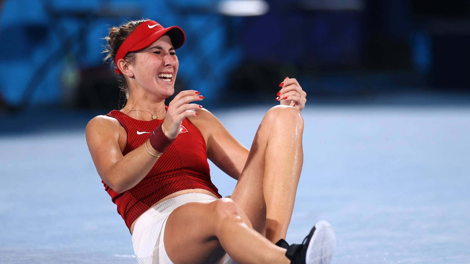 Belinda Bencic Sitting On Ground Wallpaper