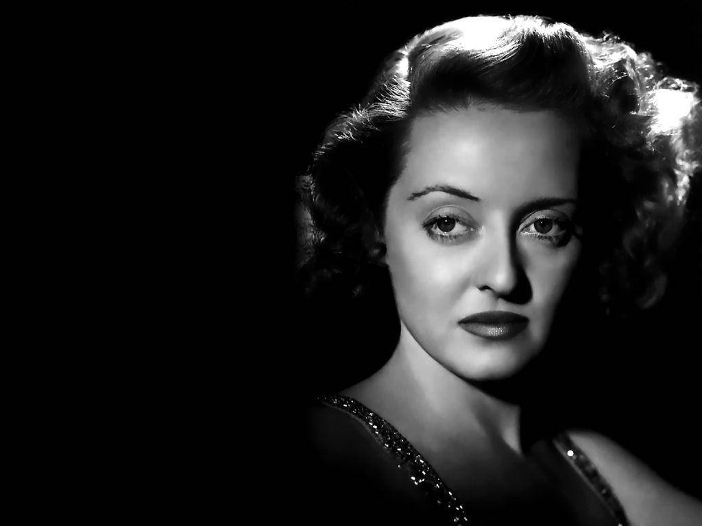 Bette Davis With Elegant Styled Hair Wallpaper