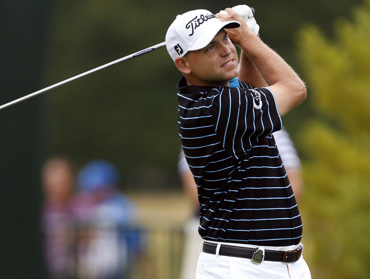 Bill Haas Showcasing His Golf Swing At A Championship Game Wallpaper