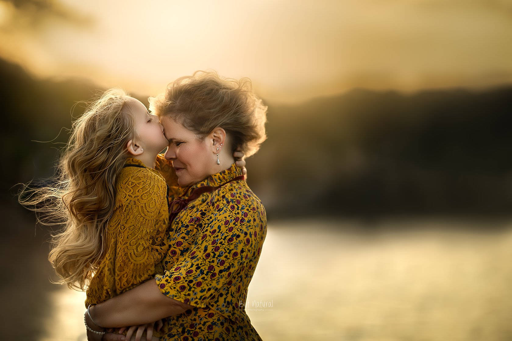 Blonde Mother And Daughter In Yellow Wallpaper