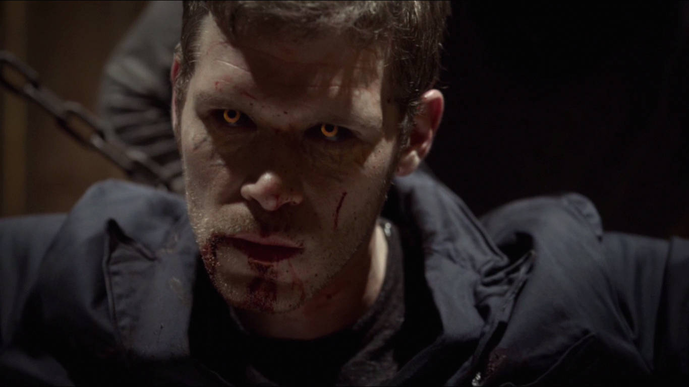 Bloody Klaus Mikaelson With Glowing Eyes Wallpaper