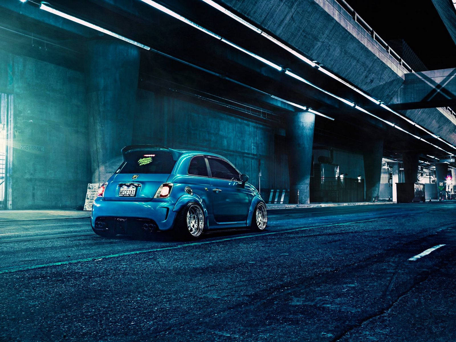 Blue Fiat Abarth 500 Driving Wallpaper