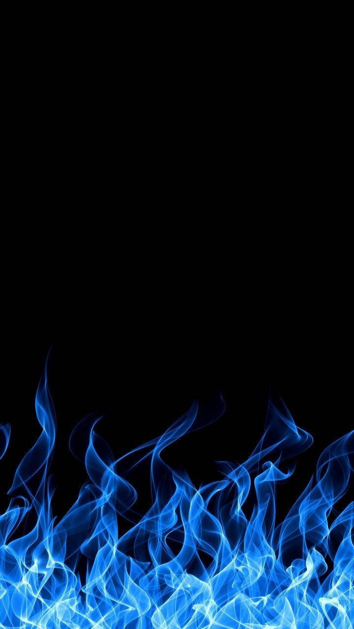 Blue Fire On A Black Background Wallpaper