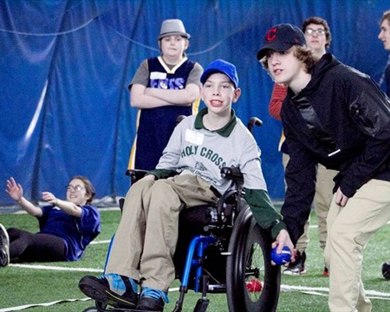 Bocce Ball Disabled Boy Holding Ball Wallpaper